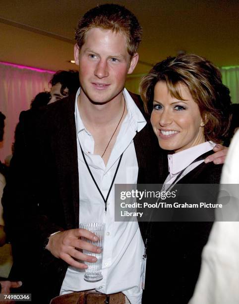 Prince Harry meets news presenter Natasha Kaplinsky at the after concert party the Princes hosted to thank all who took part in the 'Concert for...