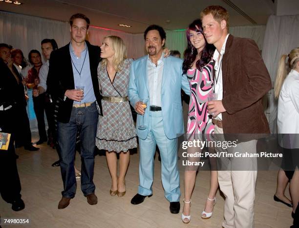 Prince William and Prince Harry pose for a photograph with Natasha Bedingfield, Joss Stone and Tom Jones at the after concert party the Princes...