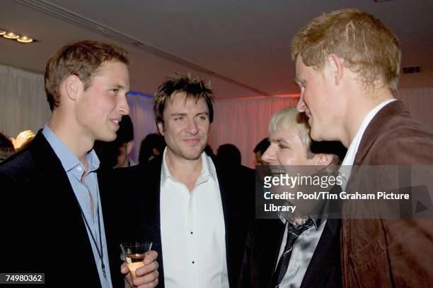Prince William and Prince Harry meet Simon Le Bon and Nick Rhodes of Duran Duran at the after concert party the Princes hosted to thank all who took...