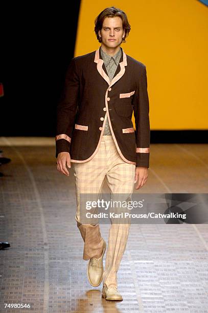 Model walks the catwalk during the Paul Smith fashion show as part of Spring Summer 2008 Paris Menswear fashion week on July 1, 2007 in Paris, France.