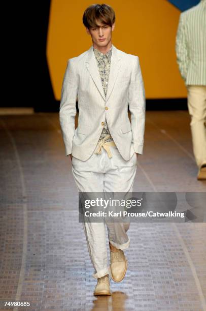 Model walks the catwalk during the Paul Smith fashion show as part of Spring Summer 2008 Paris Menswear fashion week on July 1, 2007 in Paris, France.