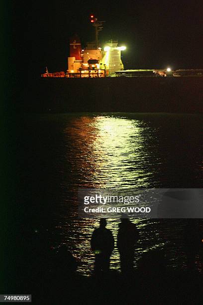 The massive coal carrier Pasha Bulker is seen stranded an Australian beach in Newcastle, New South Wales, late 02 July 2007. The coal carrier was...