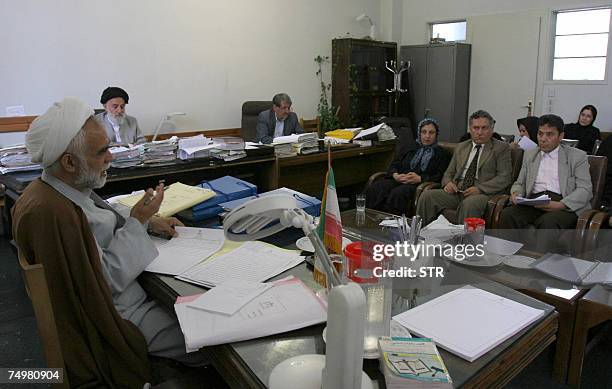 Iranian Chief judge of the trial, Mr Amiri speaks as the defence team lead by Nobel peace laureate Shirin Ebadi listen during a new appeal hearing...