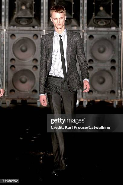 Model walks the catwalk during the Cerruti fashion show as part of Spring Summer 2008 Paris Menswear fashion week on July 1, 2007 in Paris, France.