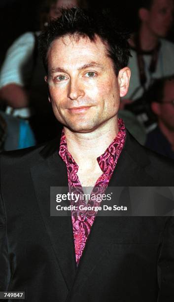 Director of the film, David McNally poses for photographers July 31, 2000 at the premiere of Coyote Ugly at the Ziegfeld Theatre in New York City.