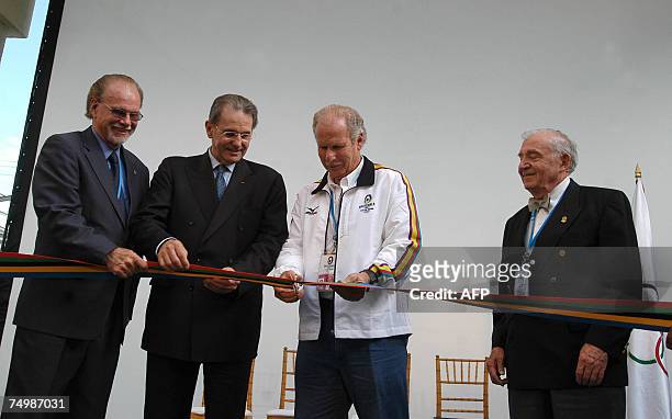 Guatemala City, GUATEMALA: From L to R: president of the IOC organizer committee Willi Kaltschmitt, IOC president Jacques Rogge, Guatemala City's...