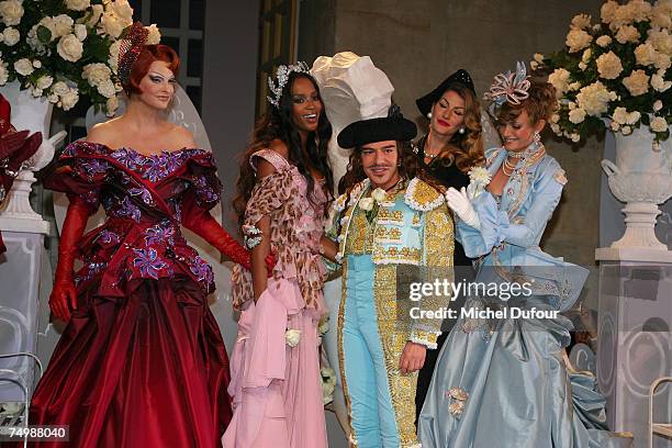 Linda Evangelista, Naomi Campbell, John Galliano, Amber Valletta walk down the catwalk during the Christian Dior Fashion show, as part of Paris Haute...