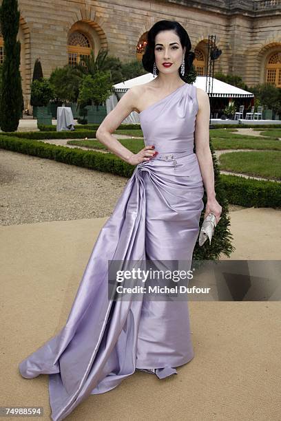 Burlesque actress Dita Von Teese attends the Christian Dior Fashion show, during Paris Haute Couture Fashion Week Fall/Winter 2007-08 at l'Orangerie...