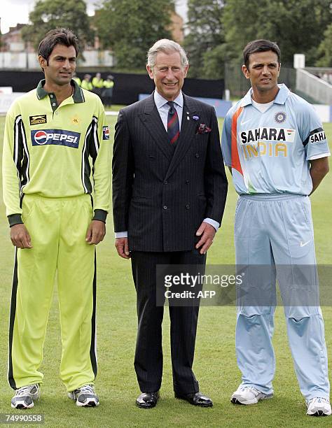 Glasgow, UNITED KINGDOM: Britain's Prince Charles meets Pakistan's cricket captain Shoaib Malik and India's captain Rahul Dravid ahead of their...