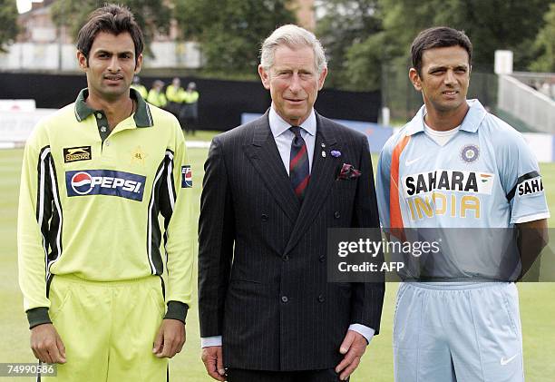 Glasgow, UNITED KINGDOM: Britain's Prince Charles meets Pakistan's cricket captain Shoaib Malik and India's captain Rahul Dravid ahead of their...