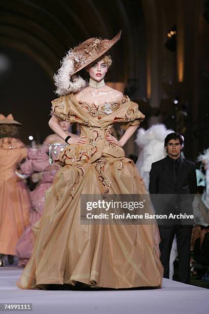 Model walks down the catwalk wearing Dior Haute Couture Fall/Winter 2008 on July 2 in Versailles, France.