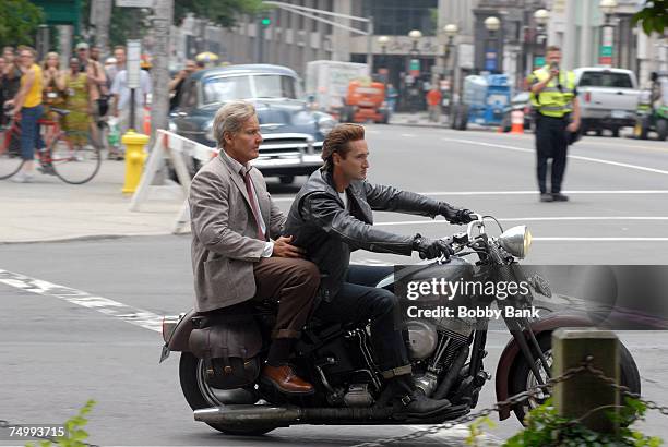 Harrison Ford stunt double and Shia LaBeouf stunt double riding a motorcycle during filming of the latest "Indiana Jones" movie at Yale University...