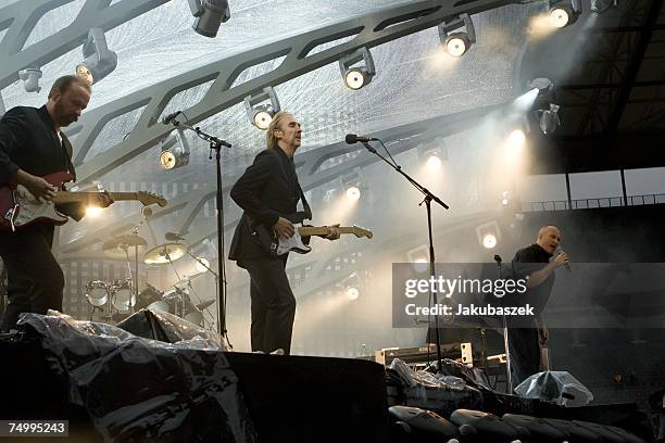 Daryl Stuermer, Mike Rutherford, Tony Banks, Phil Collins, of the reunited band Genesis perform during a concert at the Olympiastadion July 03, 2007...