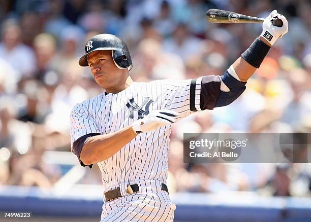 Alex Rodriguez of the New York Yankees swings at the pitch against the Oakland Athletics during the game at Yankee Stadium on June 30, 2007 in the...