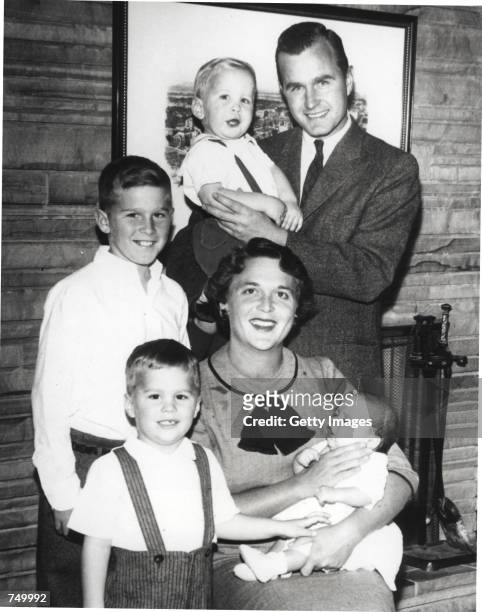 Barbara Bush and George Bush pose with children Neil Bush, George W. Bush, Jeb Bush and Marvin Bush in 1956. George W. Bush is currently campaigning...