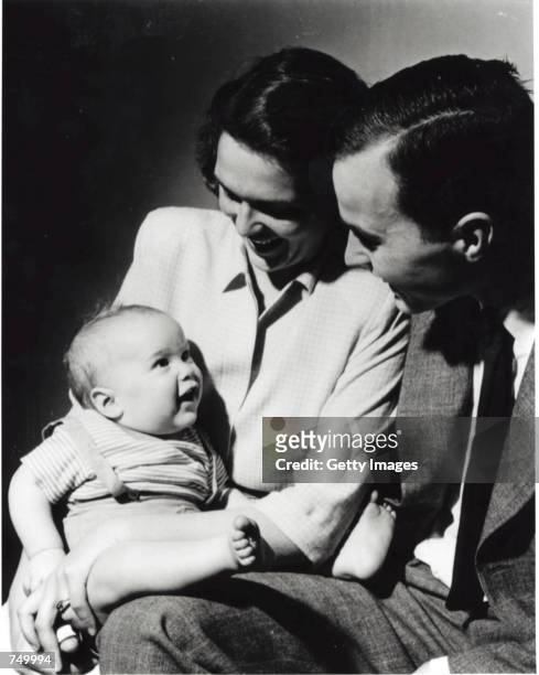 An infant George W. Bush with his mother Barbara Bush and his father George Bush posing for a portrait in New Haven, CT, April 1947. George W. Bush...