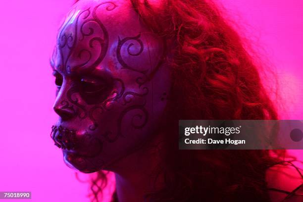 An actress dressed as a Death Eater character entertains guests at the after party following the European premiere of "Harry Potter And The Order Of...