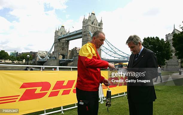 Chris Muntwyler, DHL Express CEO of the UK and Ireland signs for the Torch during the DHL-Special Olympics Torch run 'Flame of Hope', on July 4, 2007...