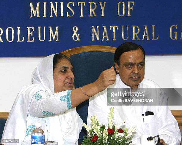 Former Chief Minister and Leader of opposition in the Indian state of Punjab, Rajinder Kaur Bhattal gestures as she speaks with Indian Minister for...