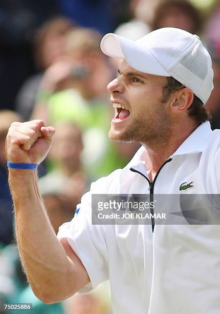 London, UNITED KINGDOM: Andy Roddick of USA celebrates after defeating Paul-Henri Mathieu of France during the fourth round of the Wimbledon Tennis...
