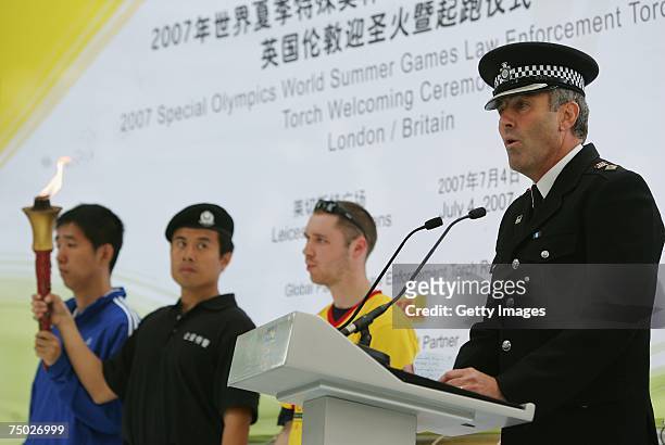 Tim Madgwick, Chairman of the Torch Run talks to the public during the DHL-Special Olympics Torch run 'Flame of Hope', on July 4, 2007 in London,...
