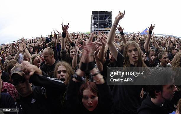 People dance to the band, Horkyze Slyze during Slovakia's Hodokvas summer music festival, 04 July 2007 in Piestany 80km from Bratislava. AFP PHOTO /...