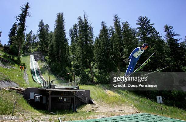 Barrett Martineau launches from the take off during the Steamboat Summer Ski Jumping Extravaganza on Howelson Hill on July 4, 2007 in Steamboat...