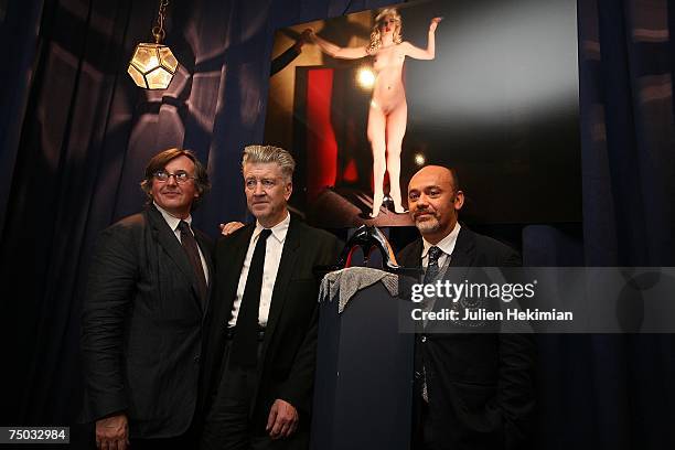 Pierre Passebon, David Lynch and Christian Louboutin at the opening of the Christian Louboutin/David Lynch cocktail party at the Galerie du Passa on...