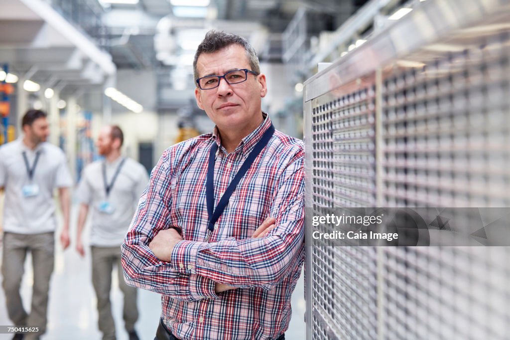 Portrait confident male supervisor in factory