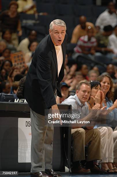 Head coach Brian Winters of the Indiana Fever gestures from the sideline during the WNBA game against the Washington Mystics on July 1, 2007 at the...
