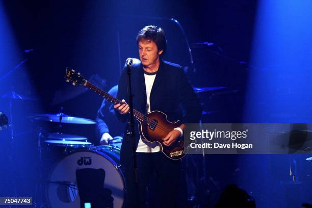 Sir Paul McCartney performs on stage as part of the iTunes Festival at the Institute of Contemporary Arts on July 5, 2007 in London, England. Over 60...