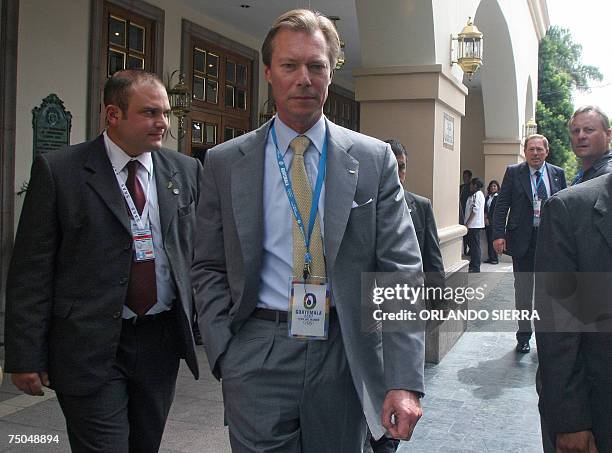 Guatemala City, GUATEMALA: Henri , Grand Duke of Luxembourg, leaves the hotel during a break in the second meeting of the 119th International Olympic...