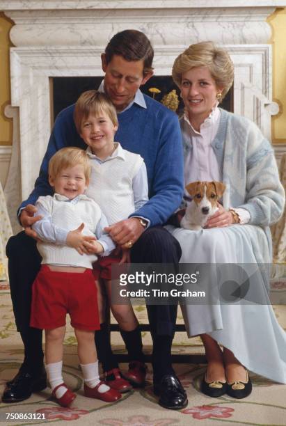 Prince Charles, Prince of Wales and Diana, Princess of Wales at home in Kensington Palace, London, with their sons Prince William and Prince Harry ,...