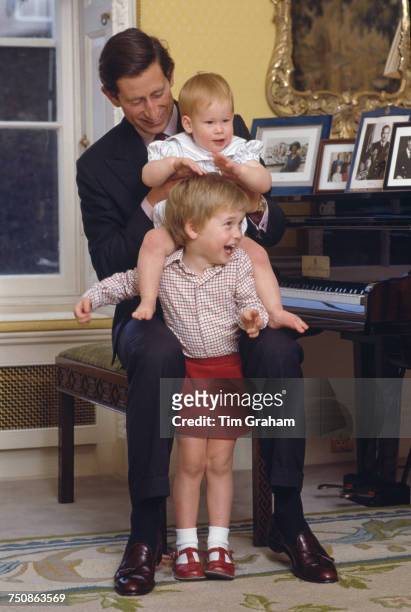 Prince Charles with his sons, Prince William and Prince Harry at Kensington Palace, London, 4th October 1985.