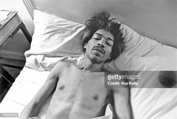 Rock and roll star Jimi Hendrix in bed at the Drake Hotel in New York, New York in 1968.