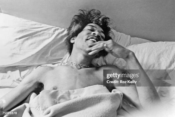 Rock and roll star Jimi Hendrix in bed at the Drake Hotel in New York, New York in 1968.
