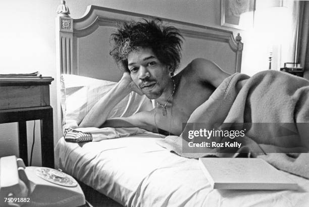 Rock and roll star Jimi Hendrix in bed at the Drake Hotel in New York, New York in 1968.