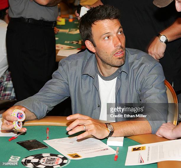 Actor Ben Affleck gets ready to compete in the Ante Up for Africa celebrity poker tournament during the World Series of Poker at the Rio Hotel &...