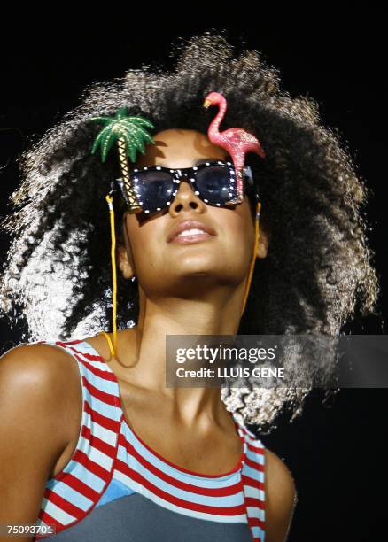 Model presents a creation of Custo Barcelona at Montjuic Castle during 'Bread & Butter' fashion show, 06 July 2007, in Barcelona. AFP PHOTO/LLUIS...