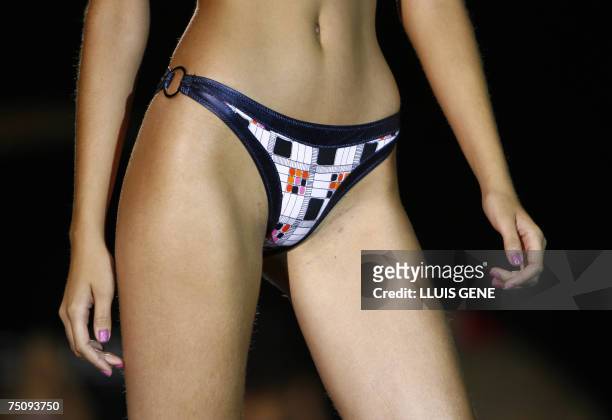 Model presents a creation of Custo Barcelona at Montjuic Castle during 'Bread & Butter' fashion show, 06 July 2007, in Barcelona. AFP PHOTO/LLUIS GENE