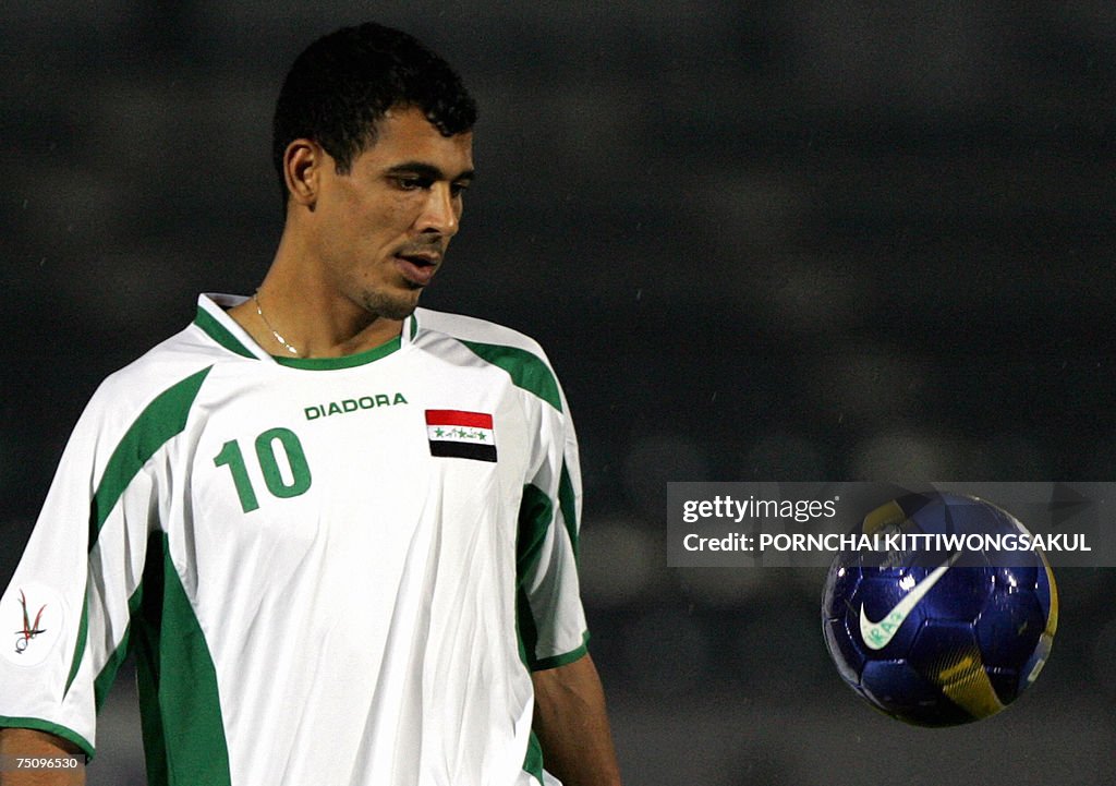 Iraq footballer Younis Mahmood juggles a...