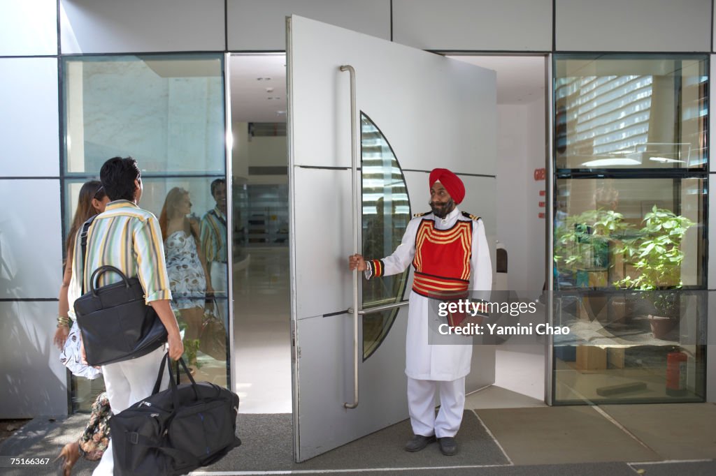 Businesspeople entering in office