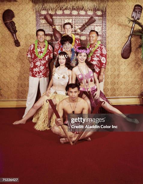 Portrait of Beachcomber Hotel staff members in Hawaii-style costumes, Harrisburg, Pennsylvania, late 1950s or 1960s.