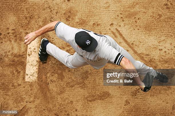 An overhead view as starting pitcher Roger Clemens of the New York Yankees warms up in the bullpen prior to a game against the Colorado Rockies on...