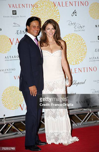 Actress Liz Hurley and her husband Arun Nayer arrive at the Ara Pacis for Valentino's Exhibition opening on July 6, 2007 in Rome, Italy. Fashion icon...