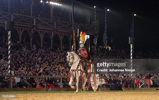 Actors dressed as knights perform during the traditional Kaltenberg Knight Tournament on July 6, 2007 in Kaltenberg, Germany. With around 120,000...