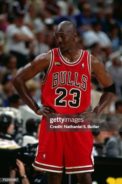 Michael Jordan of the Chicago Bulls looks to the sideline in Game One of the 1998 NBA Finals at the Delta Center on June 3, 1998 in Salt Lake City,...