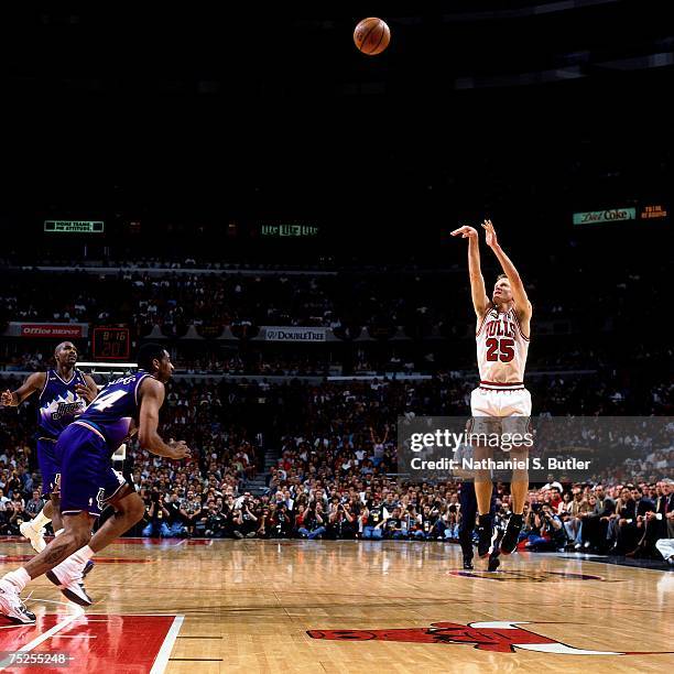 Steve Kerr of the Chicago Bulls shoots a jump shot against Chris Morris of the Utah Jazz in Game Five of the 1998 NBA Finals at the United Center on...