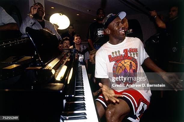 Michael Jordan of the Chicago Bulls celebrates winning the 1998 NBA Championship after Game Six of the 1998 NBA Finals against the Utah Jazz on June...