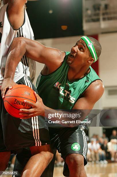 Glen Davis of the Boston Celtics looks to go strong to the hoop against the Portland Trailblazers during Game 4 of the NBA Summer League at the Cox...